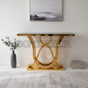 میز کنسول استیل طلایی لوکس مدل سه خط با رویه شیشه سکوریت مشکی در چیدمان منزل
