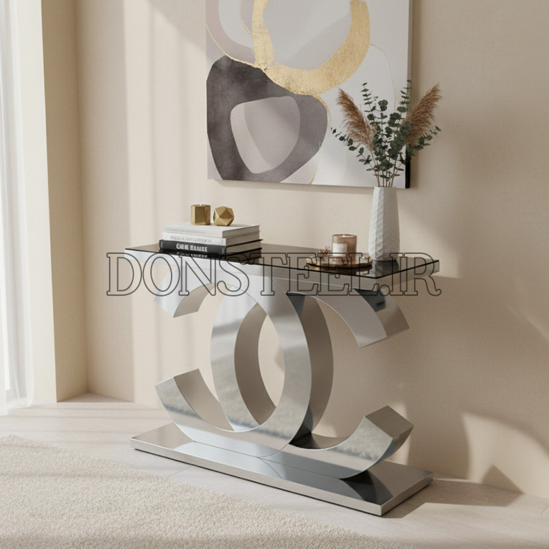 میز کنسول استیل مدل شنل 1 میز کنسول استیل نقره ای (کروم) مدل شنل با رویه مشکی در دکوراسیون اتاق